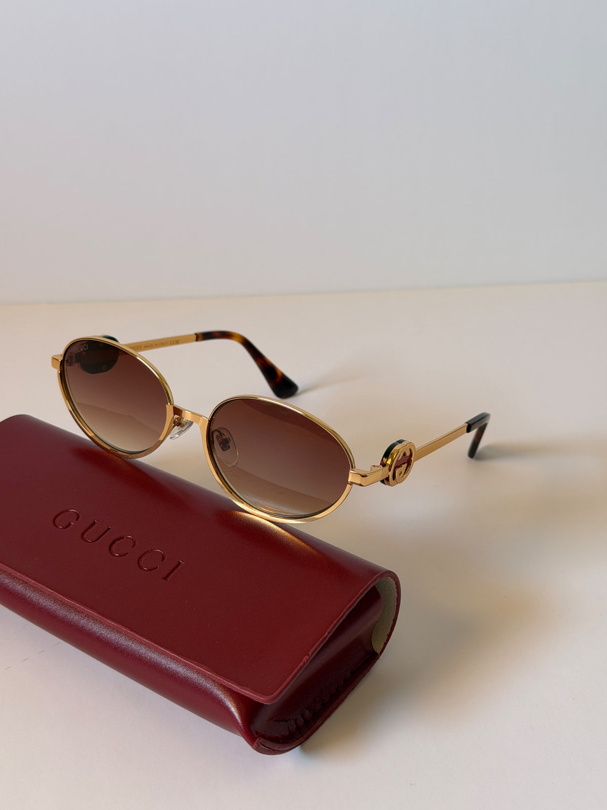 Gucci GG Cut-Out Oval Sunglasses