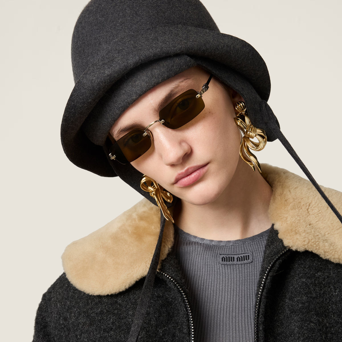 Miu Miu Vertical Logo Rimless Rectangle Sunglasses